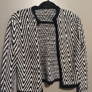 Hand made black & white sweater looks great over white shirt size S